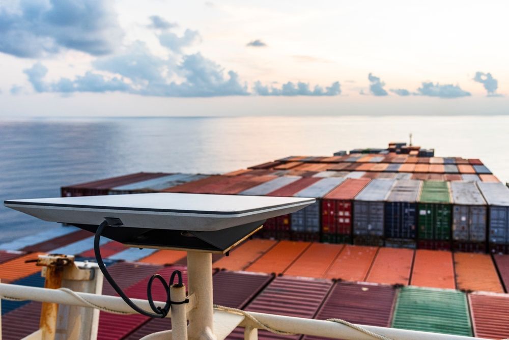 Satellite Dish On A Ship, Overlooking Containers On Deck — Shane Kelly Communications in Northern Rivers, NSW