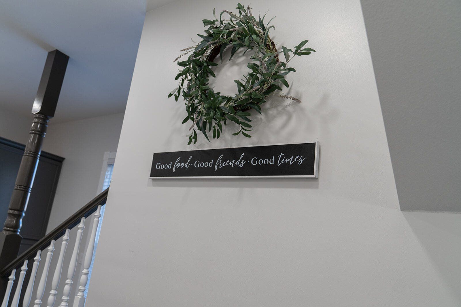 wreath and sign on the wall