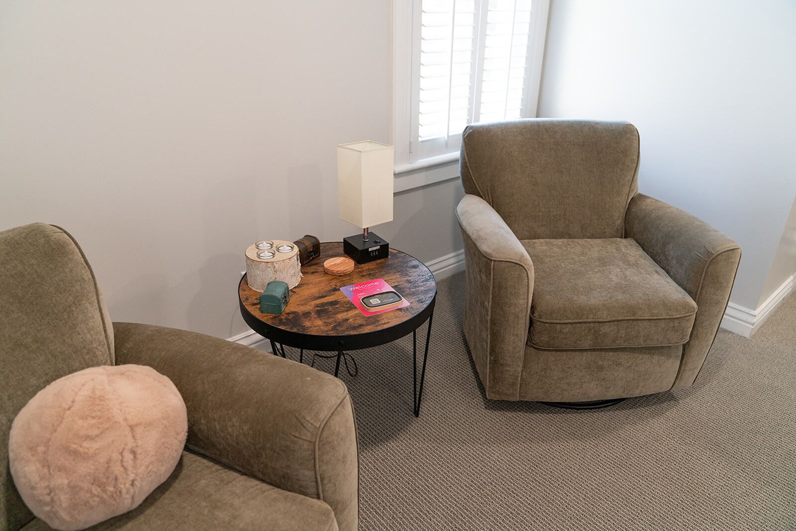 two large chairs and a table