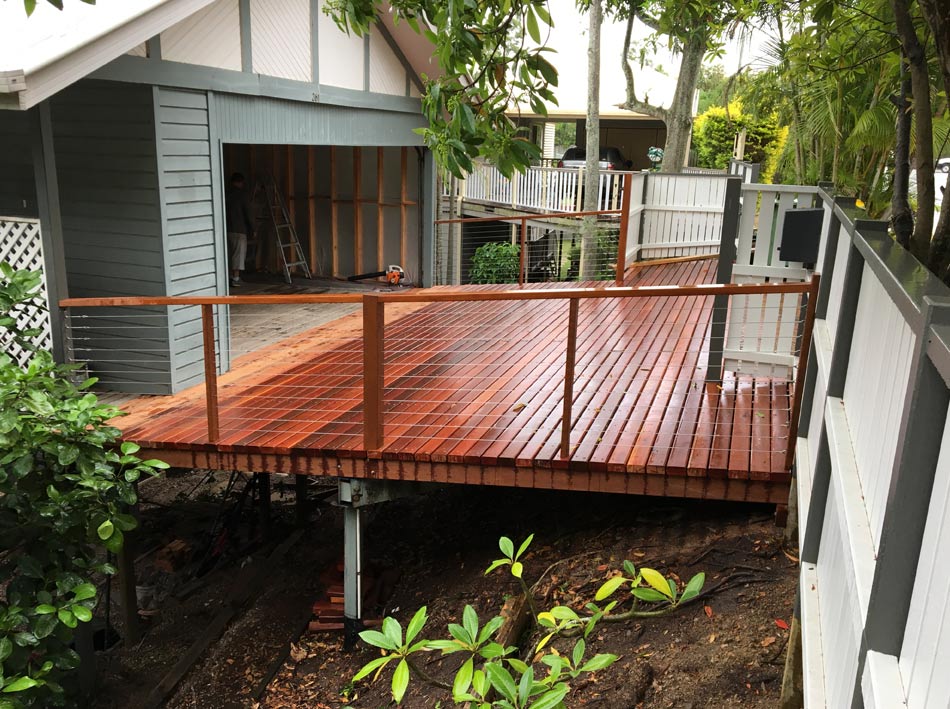 wood patio before carport