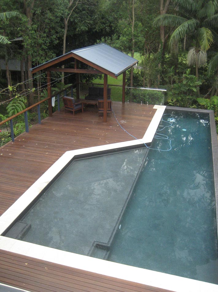 decking and pergola next to pool