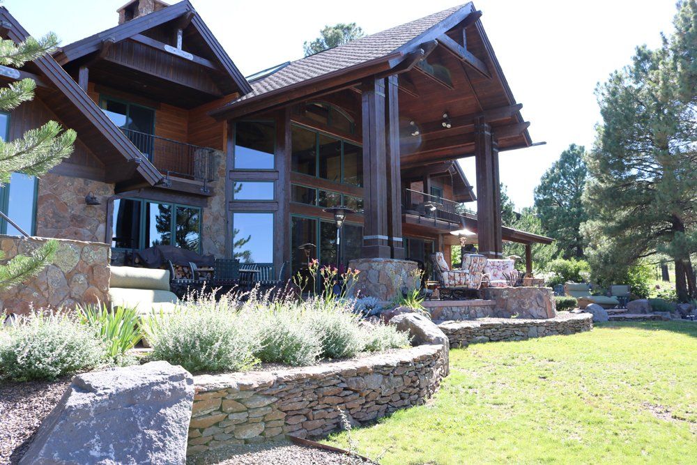 Professional Landscaper — Brown Elegant House with Clean Lawn in Flagstaff, AZ