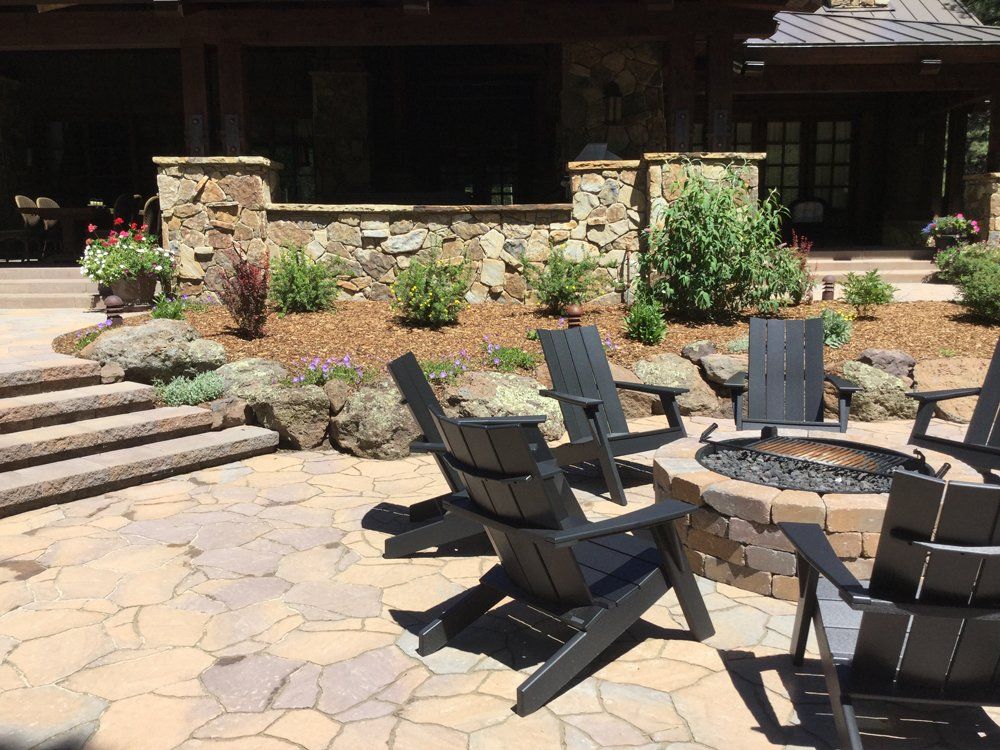 Professional Lawn Maintenance — Chairs at Patio on Sunny Day in Flagstaff, AZ