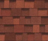 A repeating, textured pattern of overlapping architectural asphalt roof shingles in varying shades of reddish-brown.