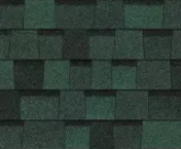 Dark green, textured asphalt roof shingles arranged in a rectangular, overlapping pattern.