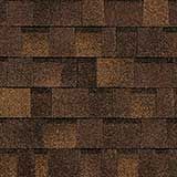 A background texture of brown architectural roofing shingles with a varied, layered pattern.