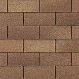 A close-up view of a standard running bond pattern made of textured, light-brown rectangular bricks.