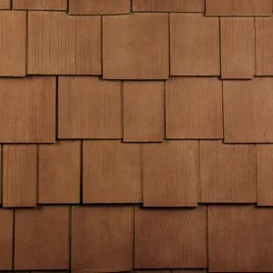 A pattern of weathered, rectangular brown wood shingles layered in staggered rows.
