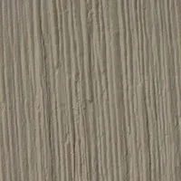 A close-up view of a light beige or taupe surface with a vertical, wood-grain-like embossed texture.