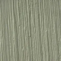 A close-up view of a sage green, textured surface with vertical, brushed lines resembling wood grain or fabric.