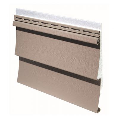 A cross-section of tan insulated vinyl siding showing the textured panel, nailing hem, and thick white foam backing.