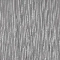 A close-up view of a light gray surface featuring a distinct, vertical wood-grain or brushed-paint texture.