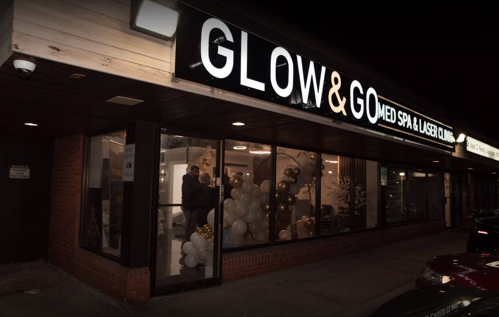 A store front with a sign that says glow & go