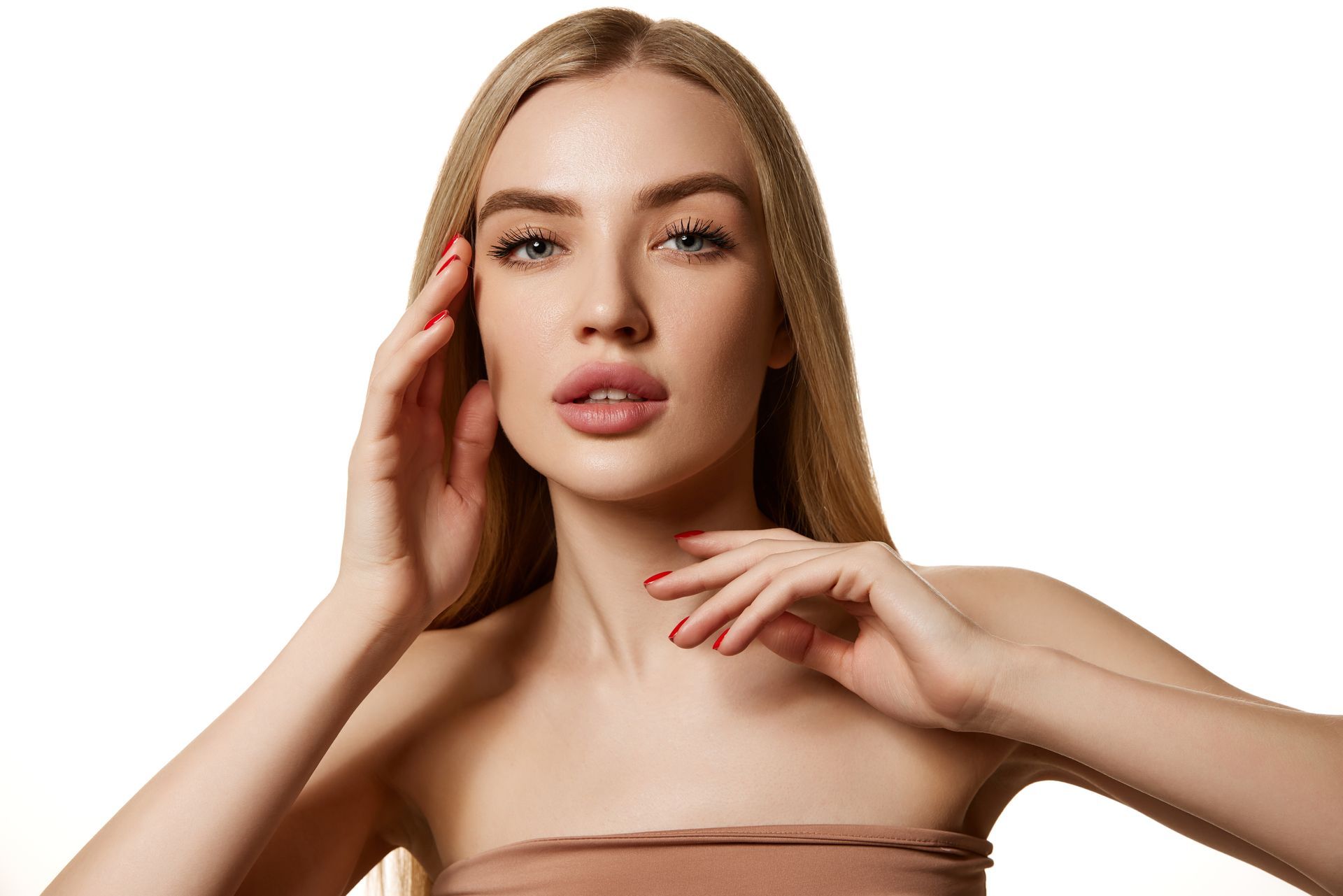 woman touching her face