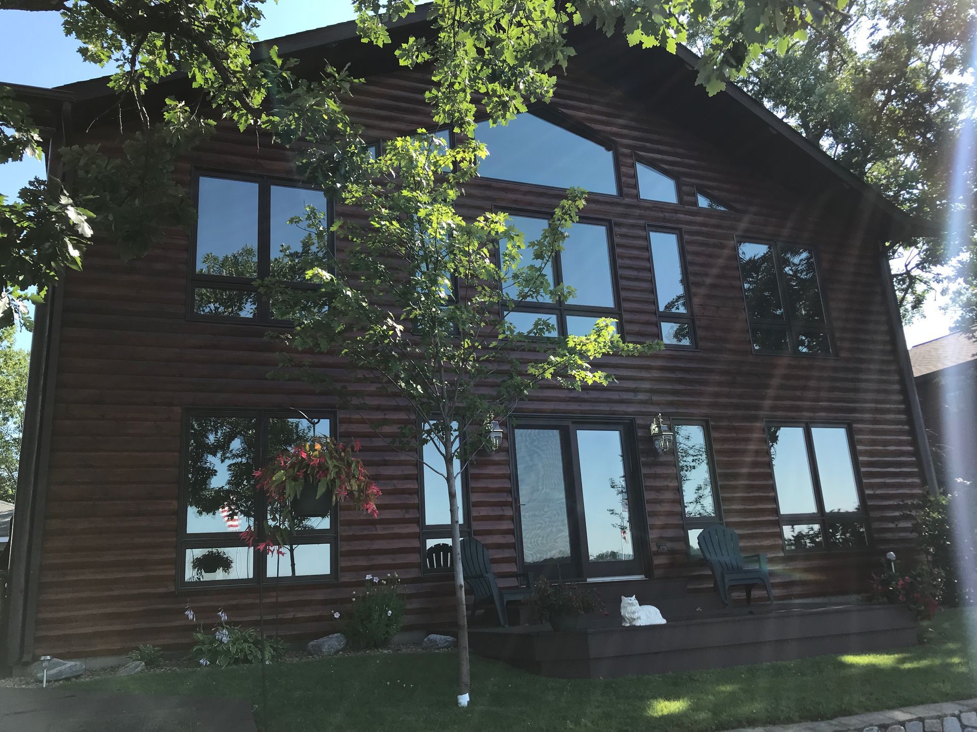 A House With a Lot of Windows – MN - Lifetime Staining and Log Restoration