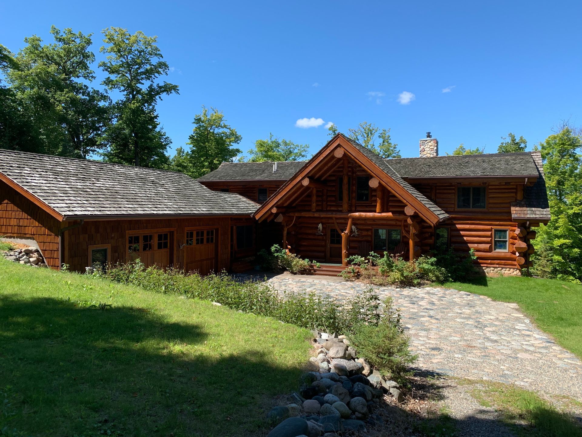 Log Cabin With a Driveway – MN - Lifetime Staining and Log Restoration
