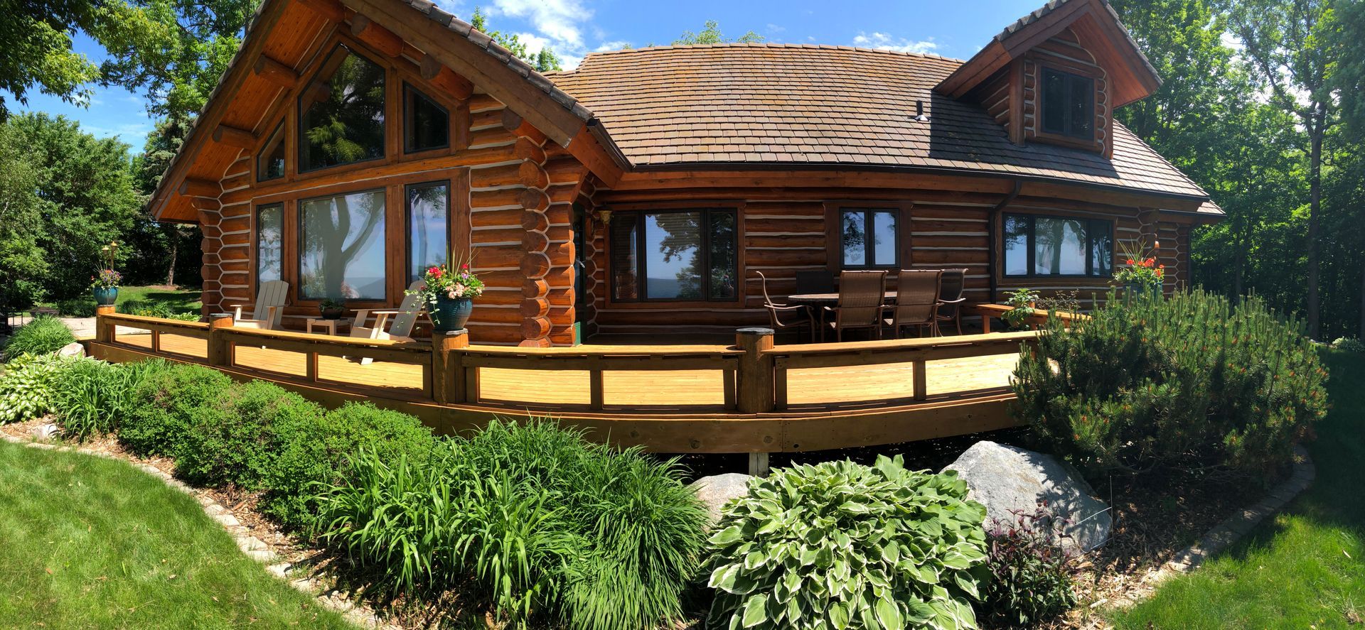 Large Log Cabin With a Large Deck – MN - Lifetime Staining and Log Restoration