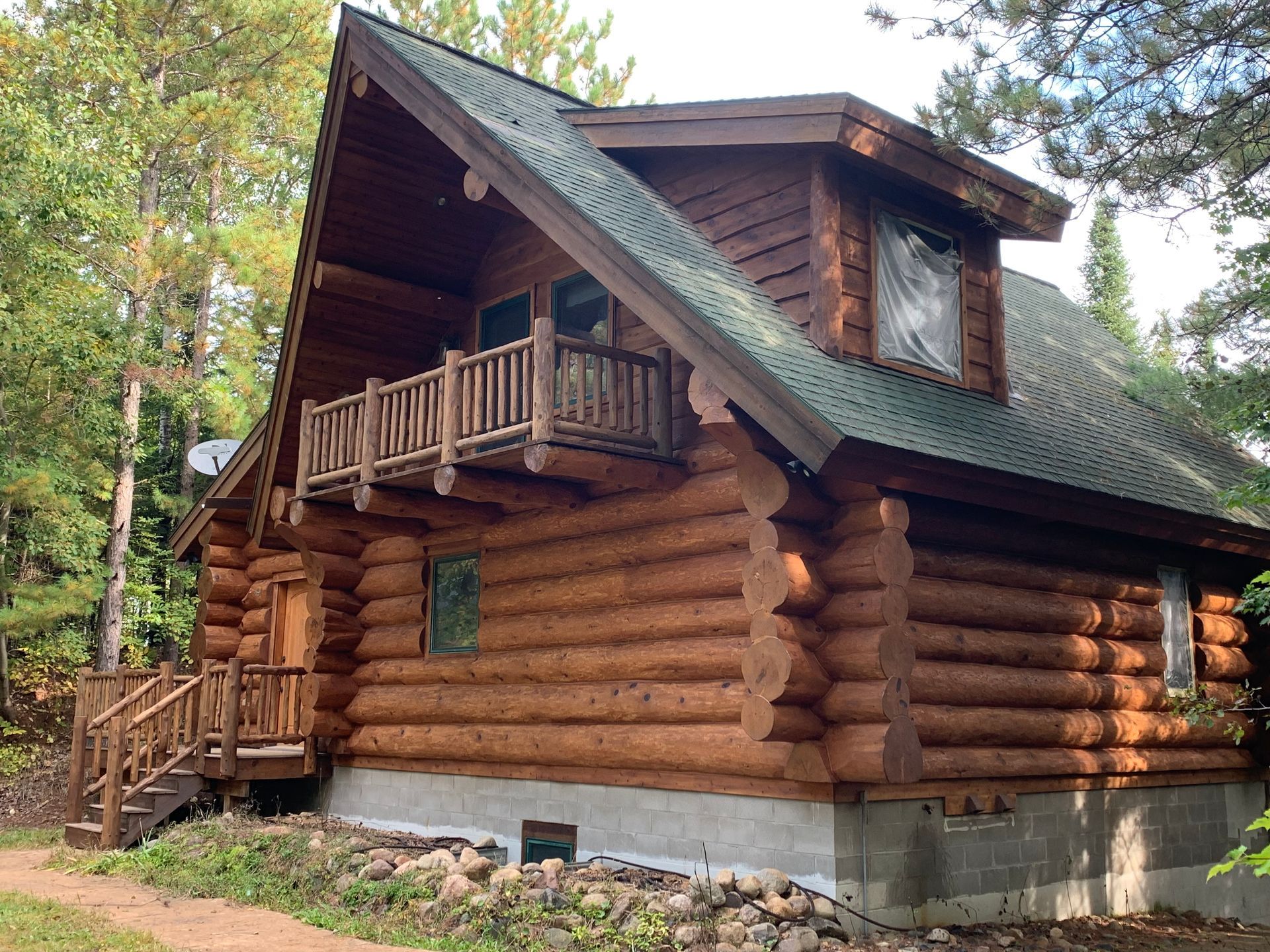 Cozy Cabin Nestled In The Woods - Minnesota - Lifetime Staining and Log Restoration