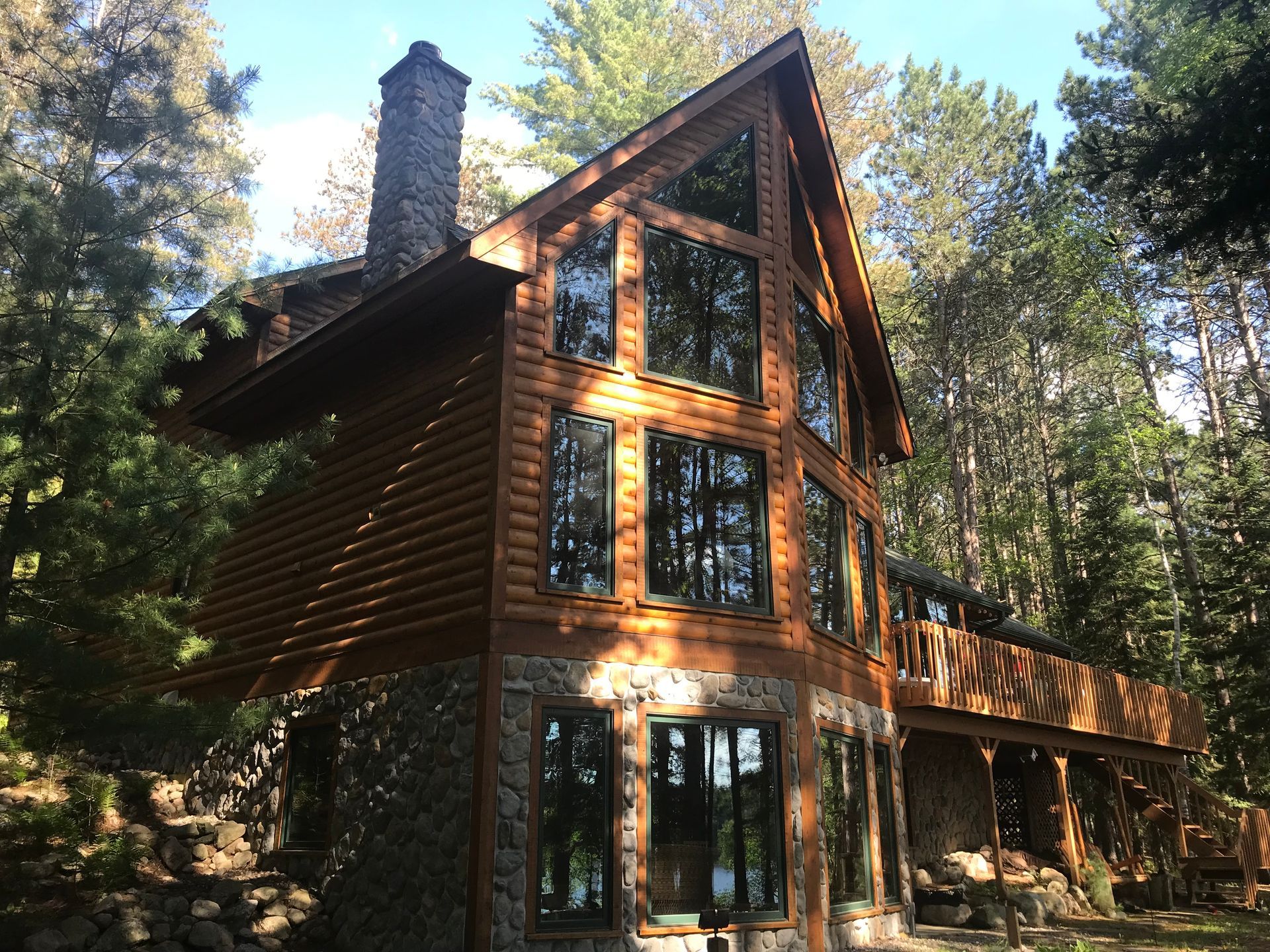 Log Cabin in the Middle of a Forest – MN - Lifetime Staining and Log Restoration