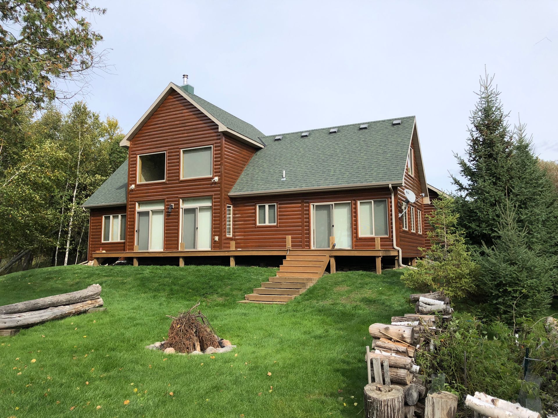 A Wooden House – MN - Lifetime Staining and Log Restoration