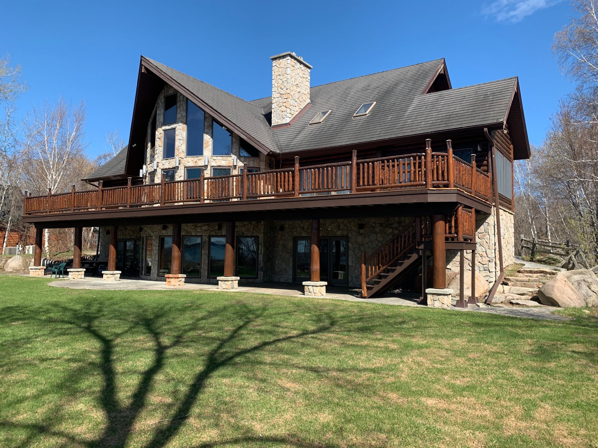 Cabin With a Large Deck – MN - Lifetime Staining and Log Restoration