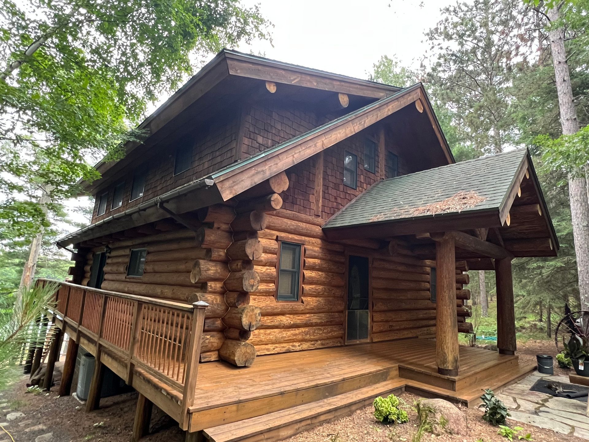 A Large Log Cabin With a Large Deck – MN - Lifetime Staining and Log Restoration
