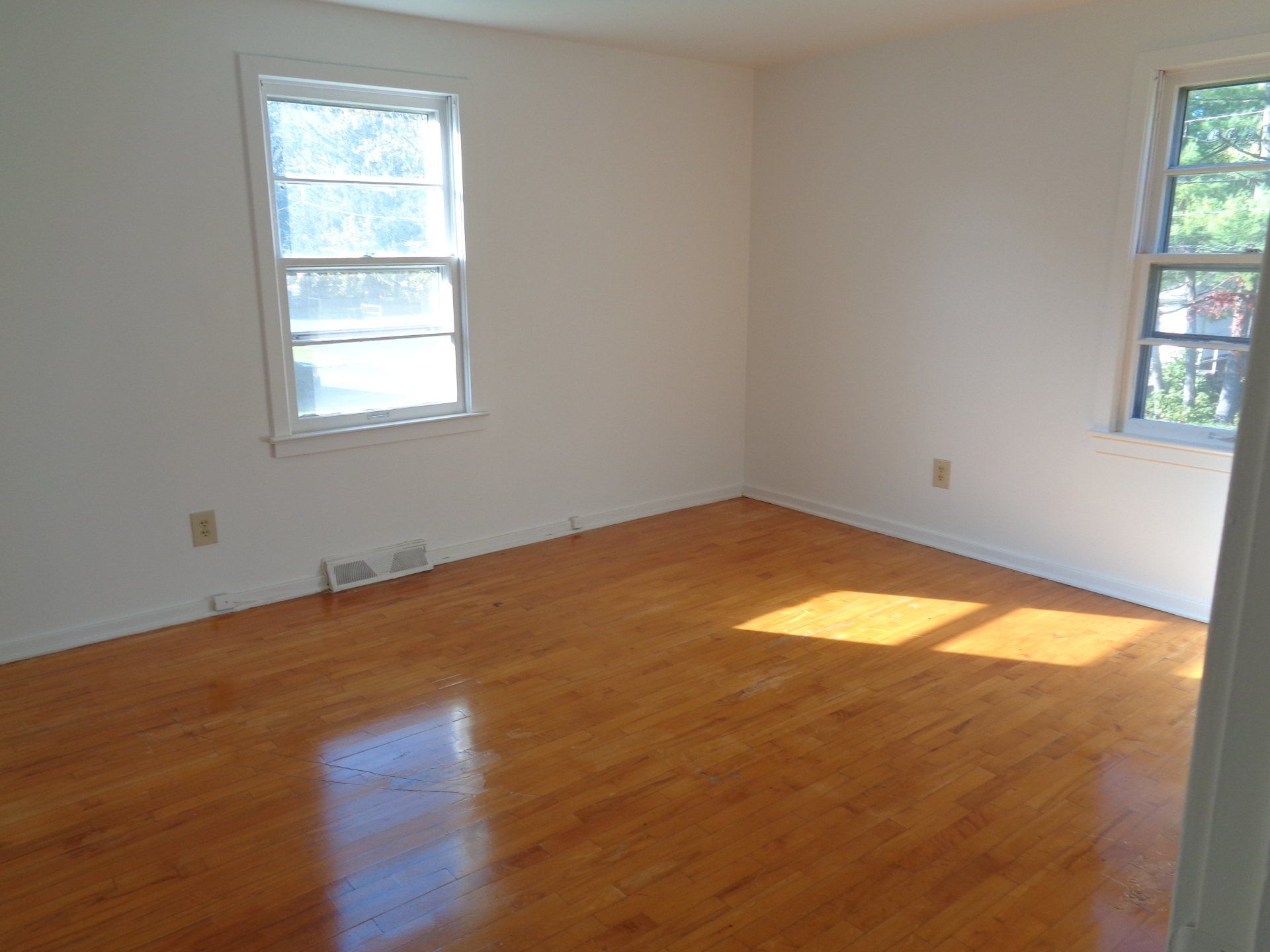 Apartment bedroom with windows