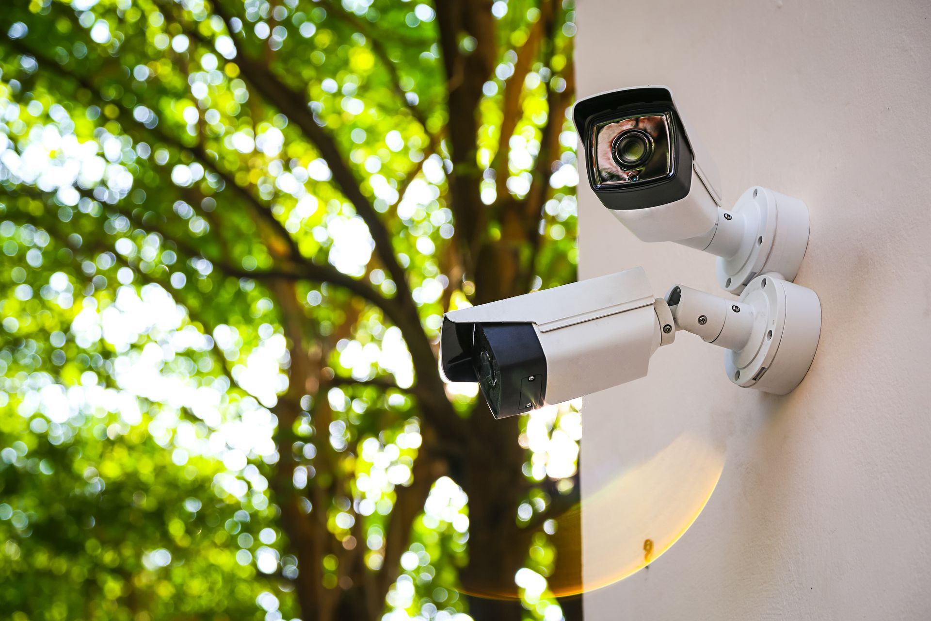 Outdoor security cameras installed on home exterior.