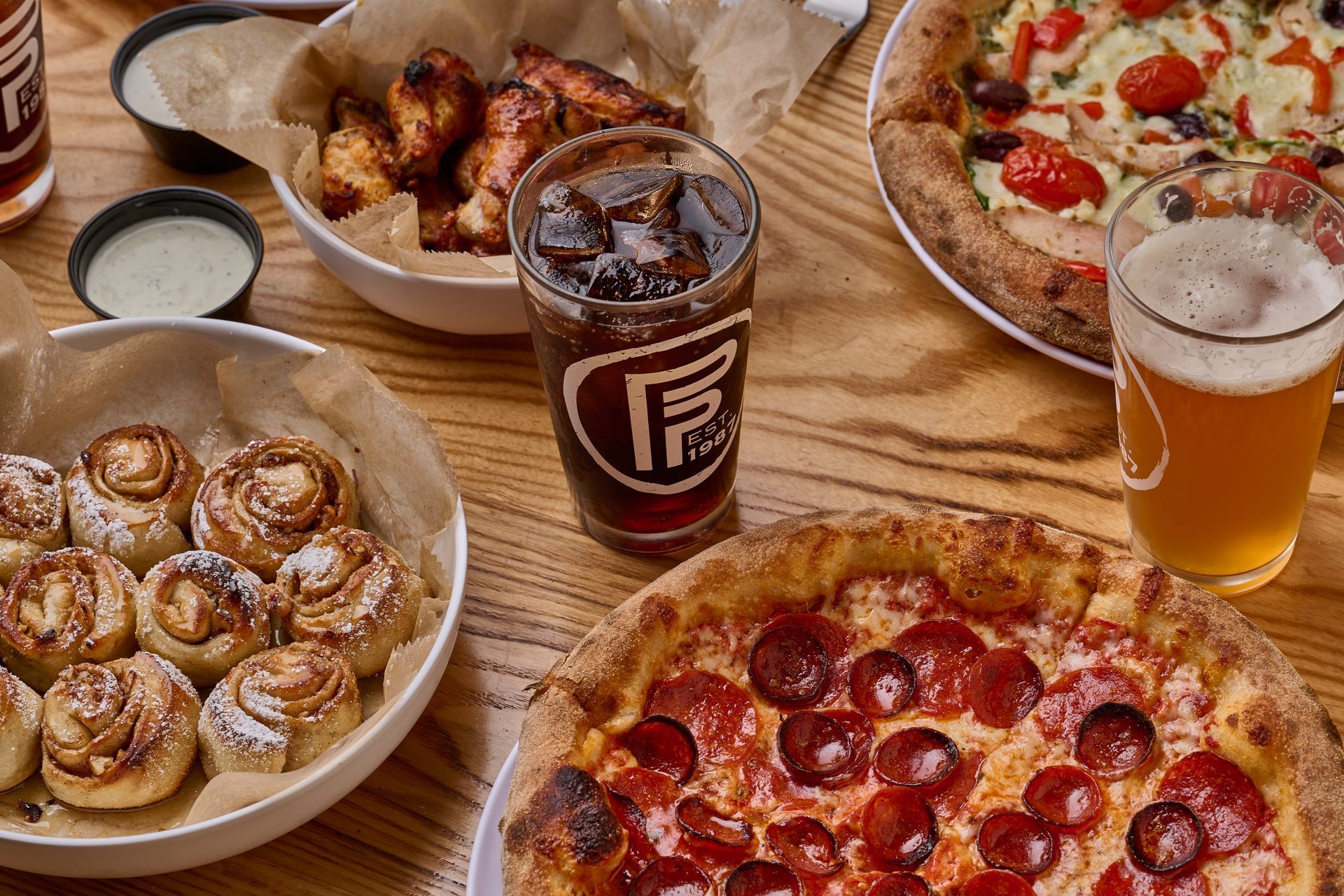 Pizza, Wings, and Cinnamon Buns at Flippers Pizza Co in Windermere FL