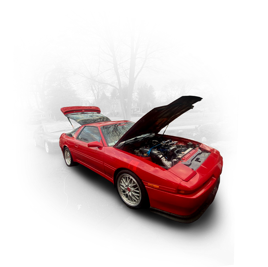 A red car with the hood up is parked in the fog | Compassion Auto Care LLC