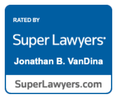 A blue sign that says super lawyers jonathan b. vandina