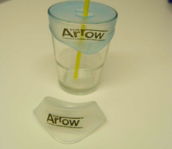 A glass with the word arrow on it