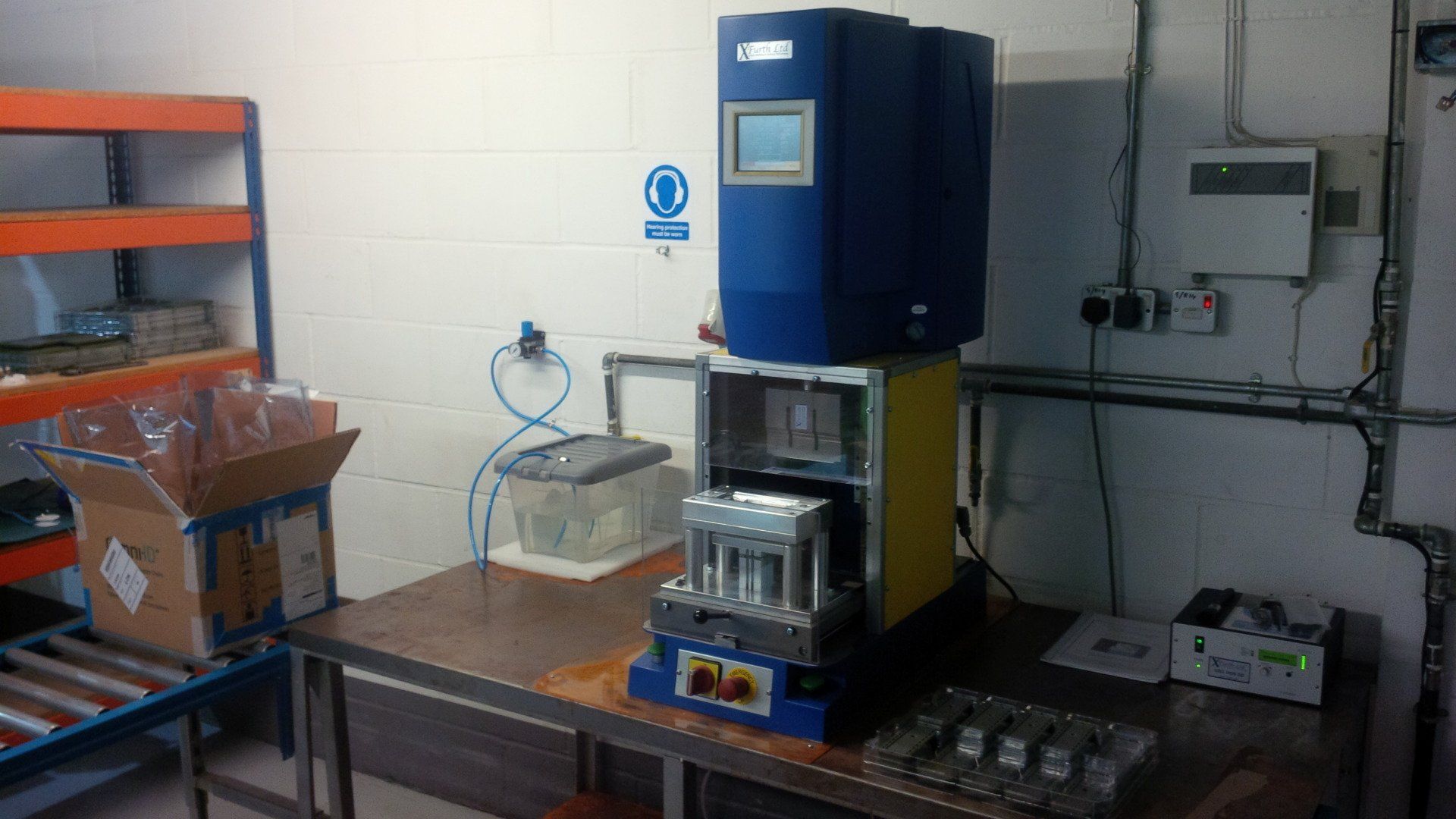 A machine is sitting on top of a table in a room.