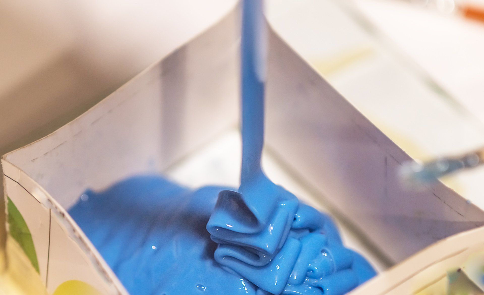 Liquid silicone rubber being poured in moulding process
