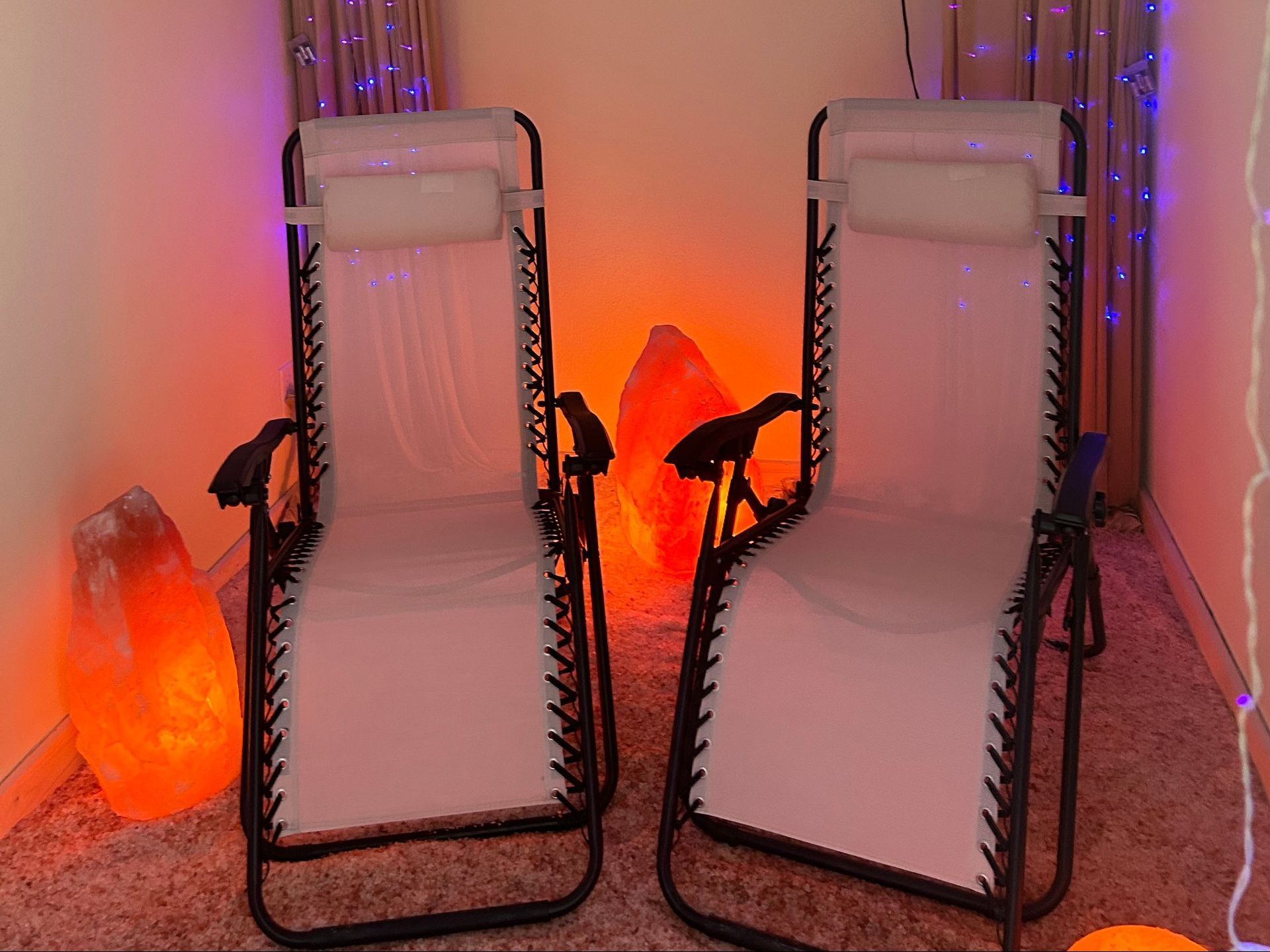 Two lounge chairs in the salt and spa.