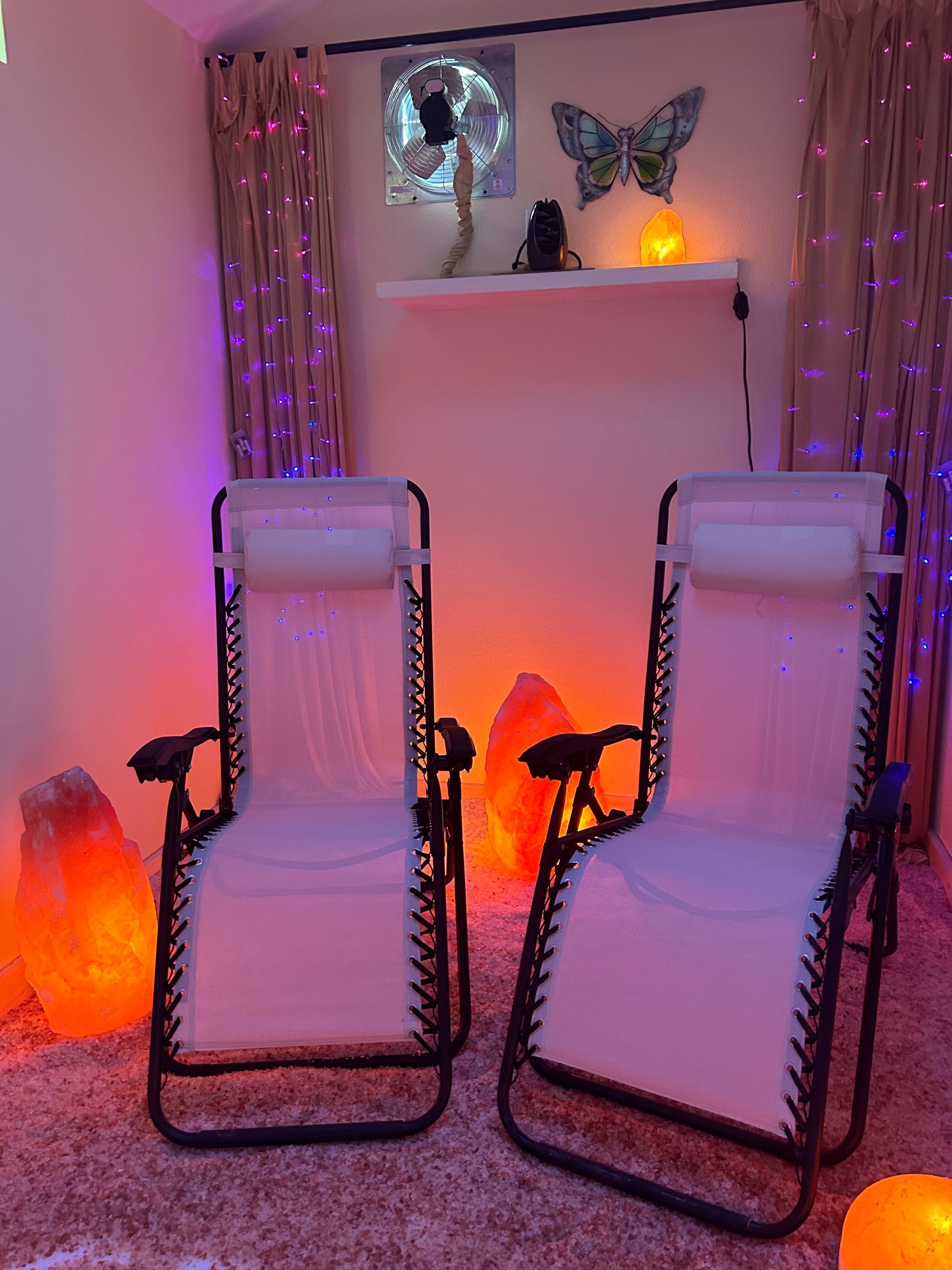 Two lounge chairs in the salt and spa.