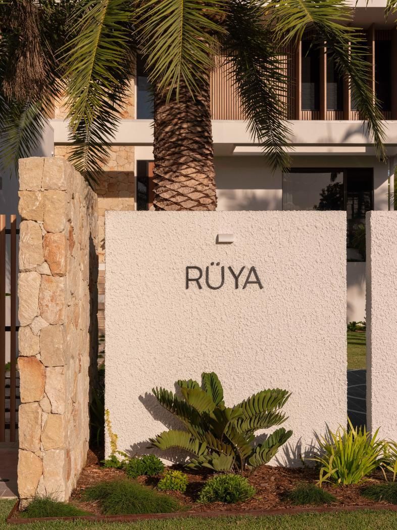 A stone wall with the word 