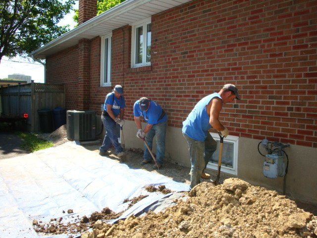 exterior waterproofing services toronto done by drainworks plumbing crew working