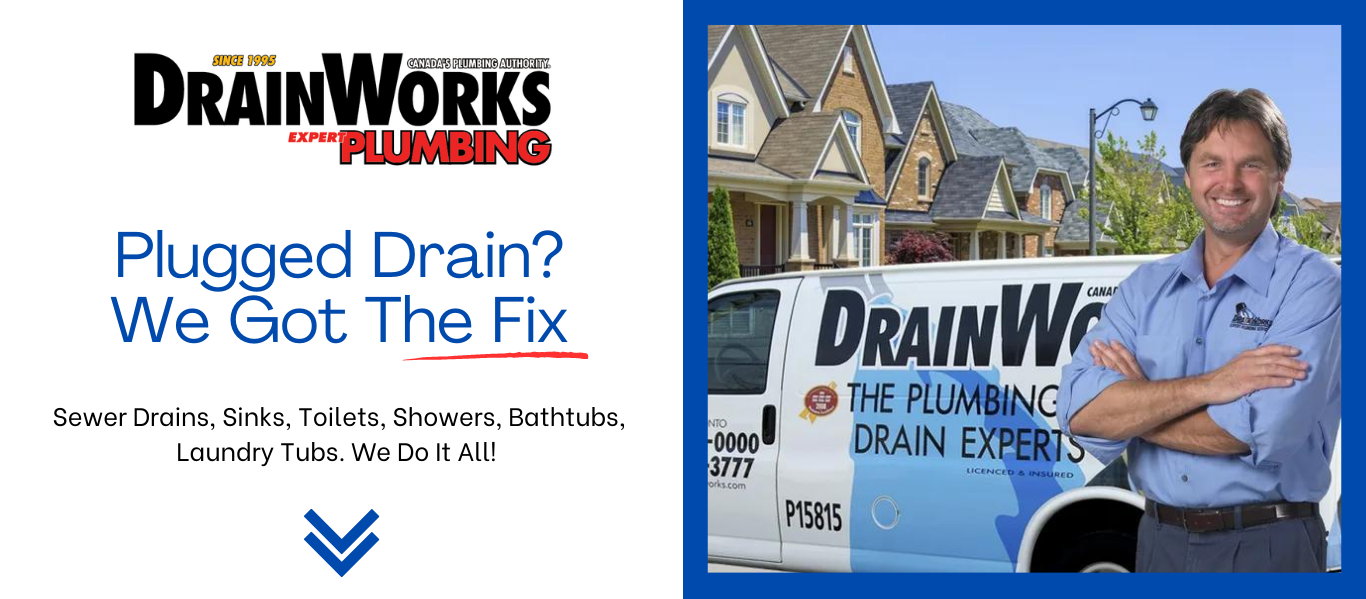 A man is standing in front of a drain works van