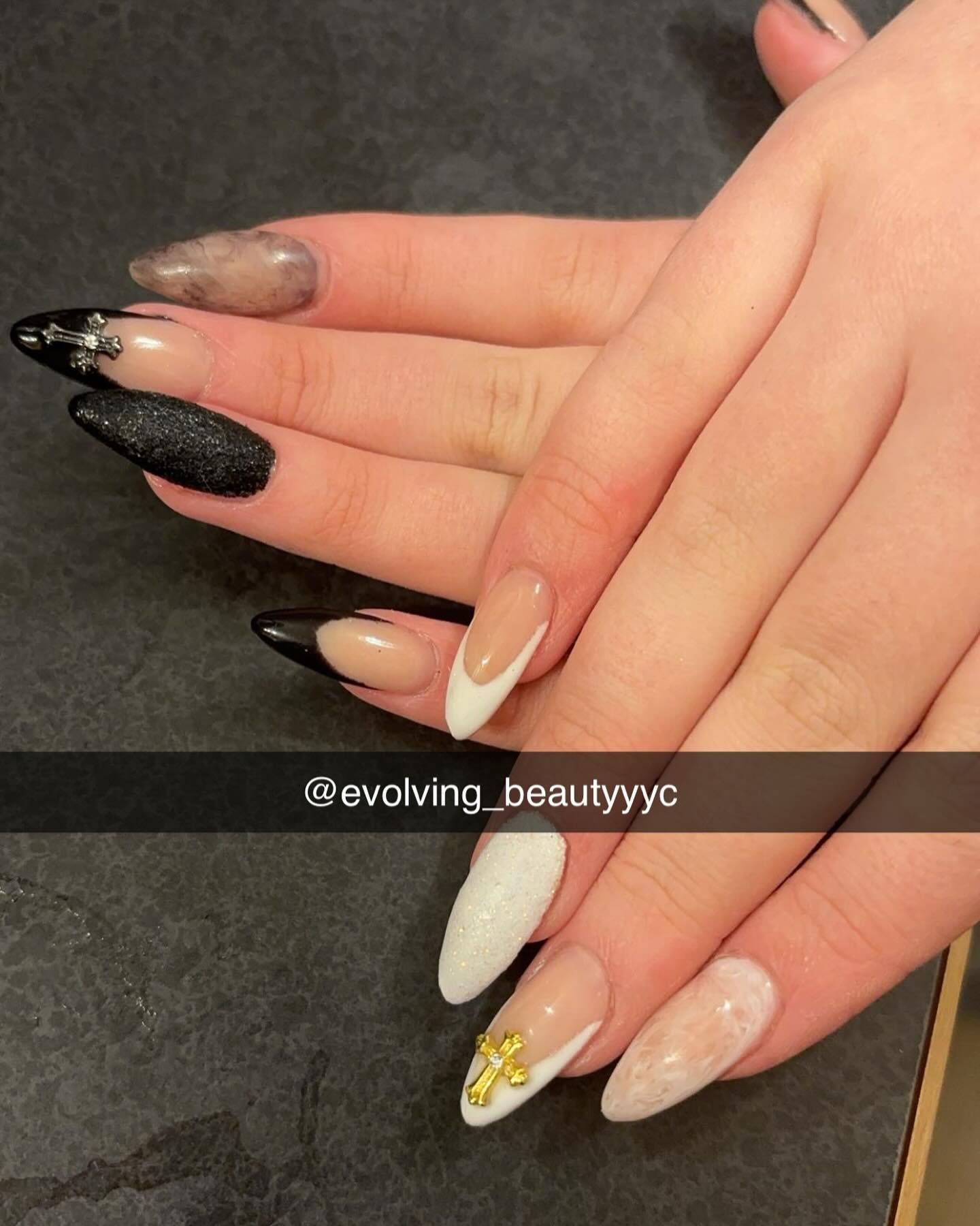 A close up of a woman 's nails with a caption that says evolving beautyyyc