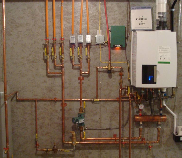 Gas Boiler in the Boiler Room — Plumbing in Vernon, VT