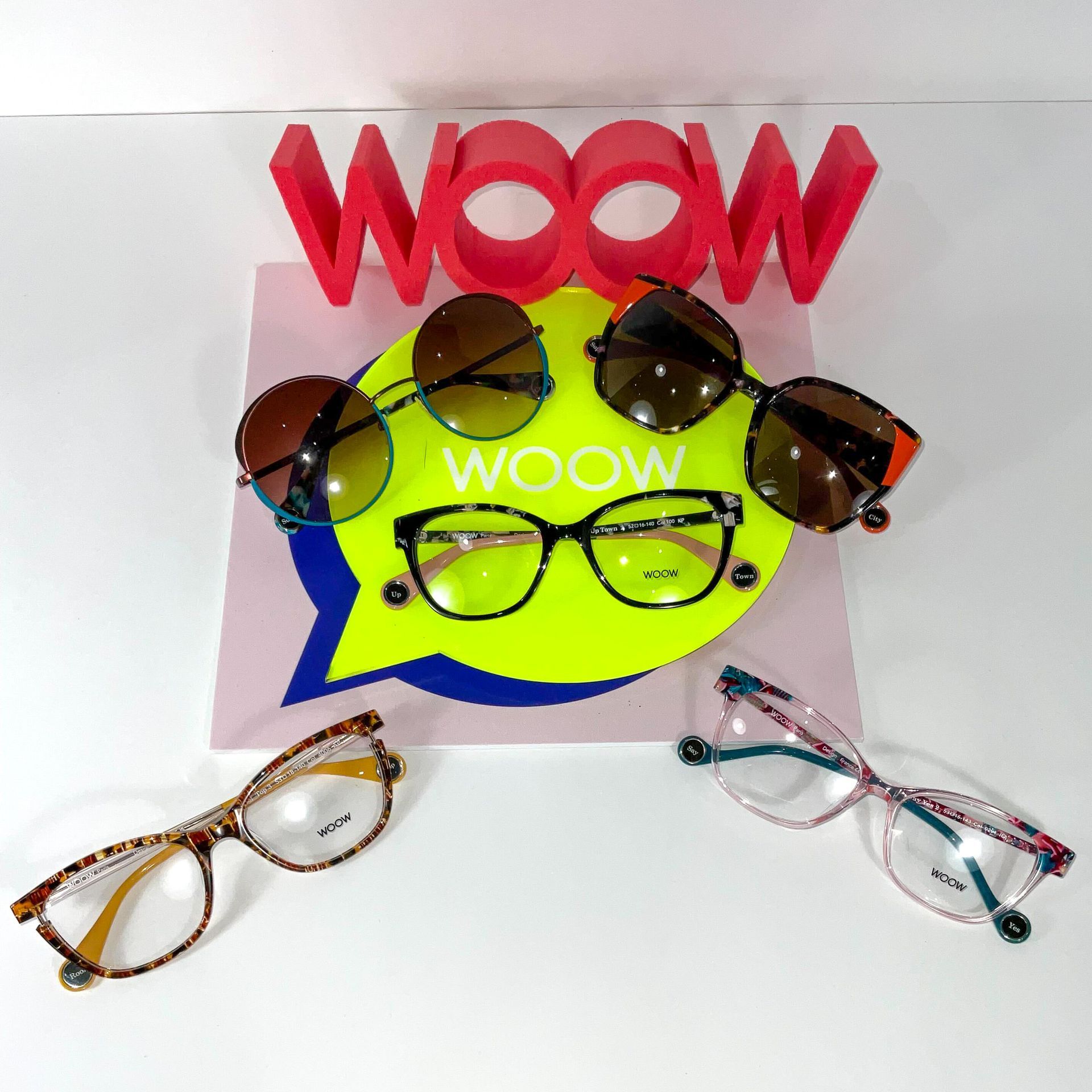 multiple Woow glasses frames with colorful background