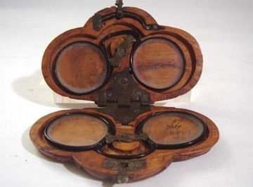 Balleen frames in a wooden case.