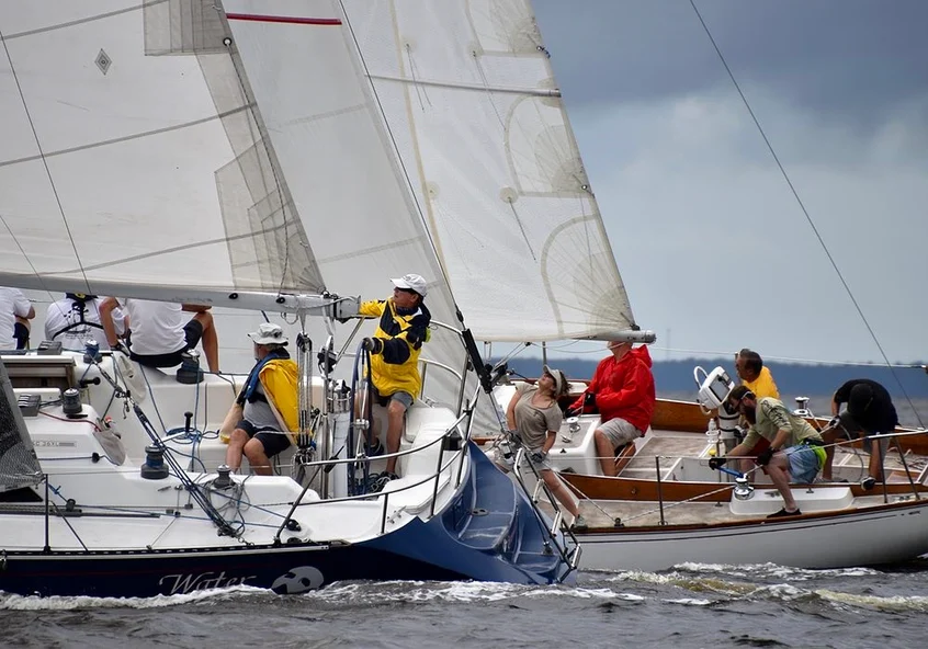 Multiple sail boats, crews of many people working together to run the ships. Protective eyewear blog