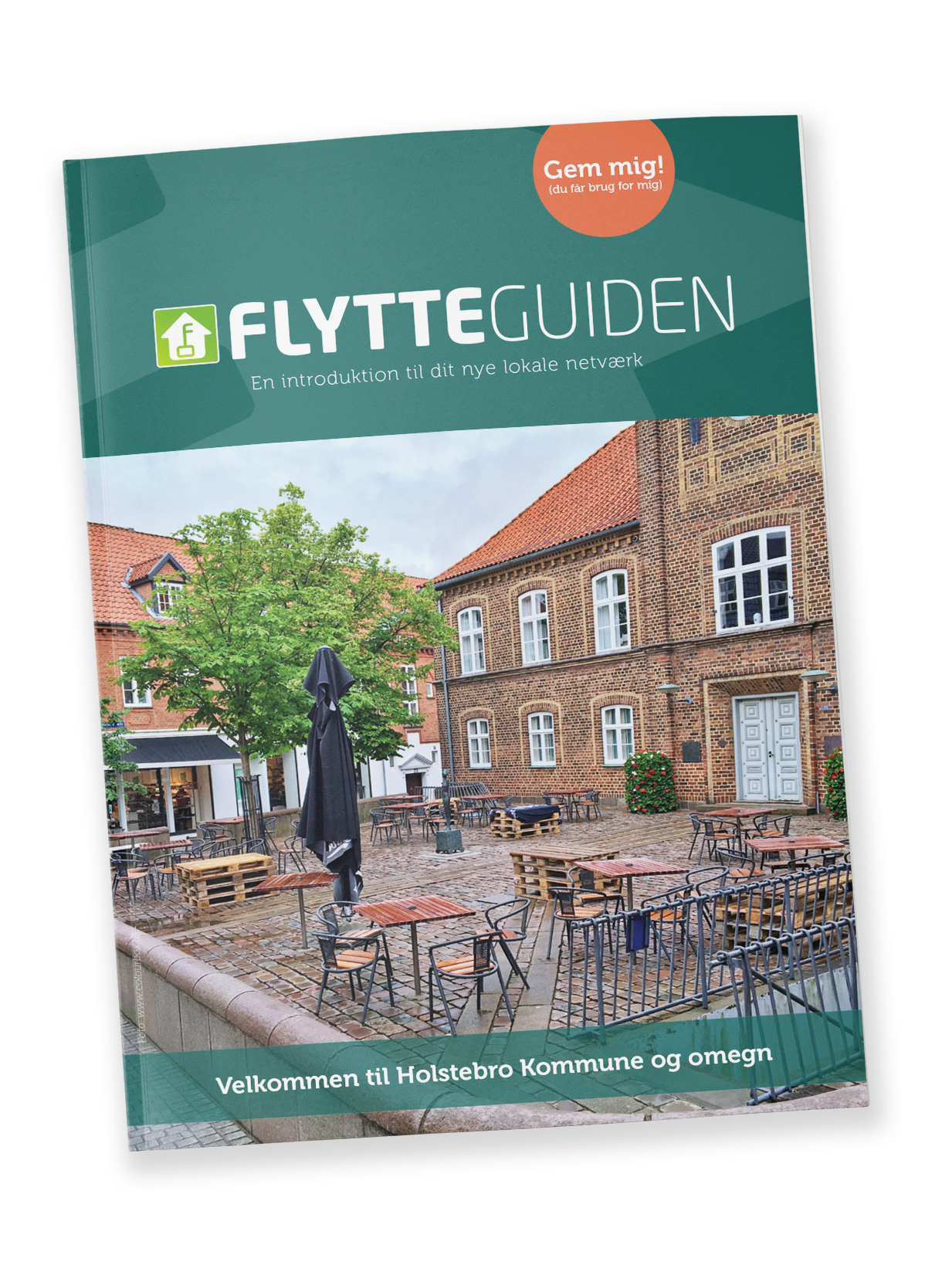 En grøn bog med et billede af et slot på omslaget