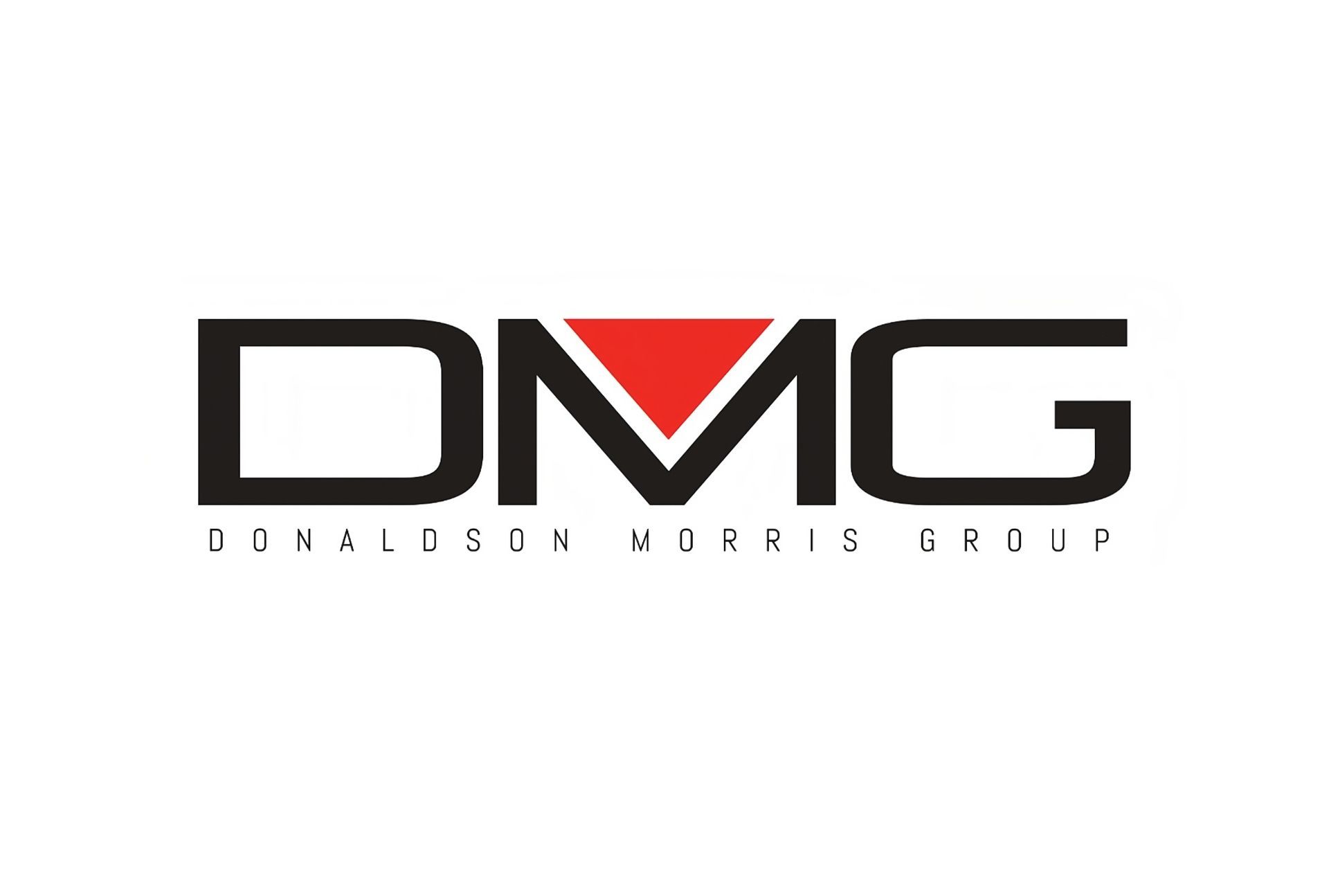 The dmg logo is black and red with a red triangle in the middle.