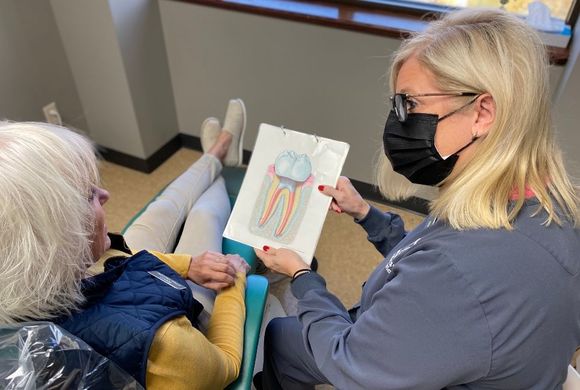 Dentist Checking A Patient — Omaha, NE — Midwest Endodontics