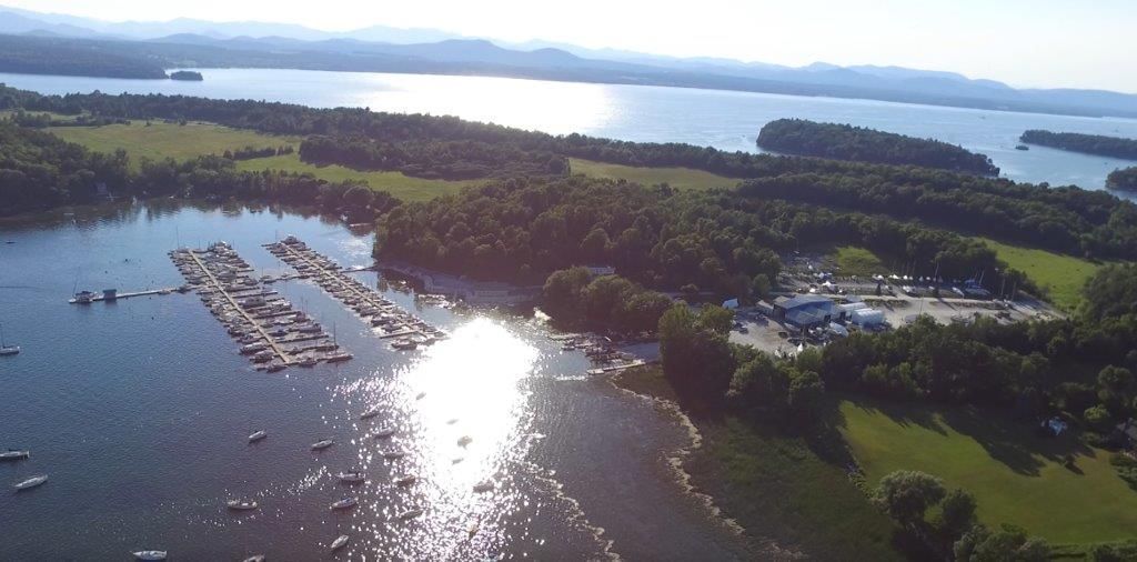 An aerial view of a large body of water surrounded by trees
