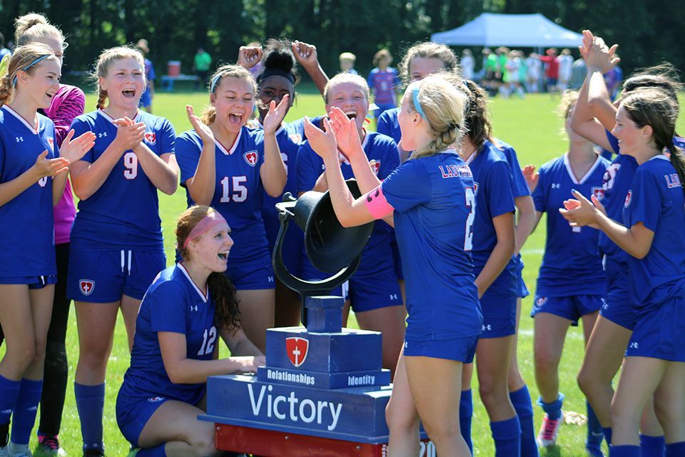 The ODCS girls varsity soccer team celebrates a win