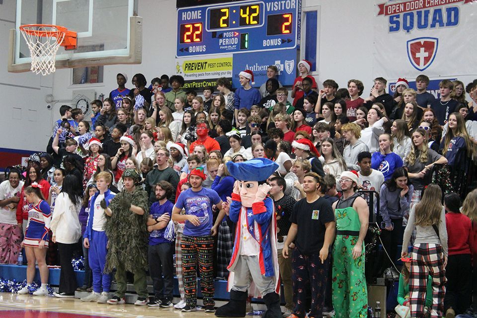 The ODCS basketball crowd cheers the home team on to victory